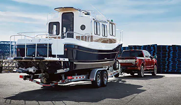 2022 Nissan TITAN Truck towing boat | Nissan of Fremont in Fremont CA